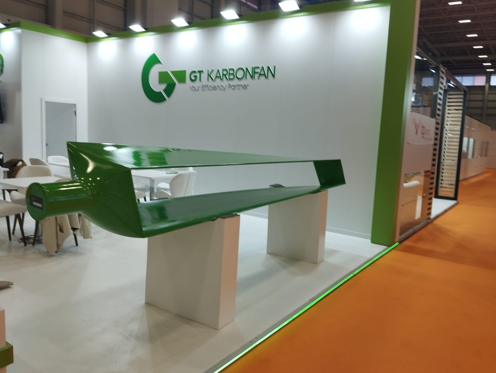GT Carbon Fan exhibition stand with a GT Green Fan loop blade on display